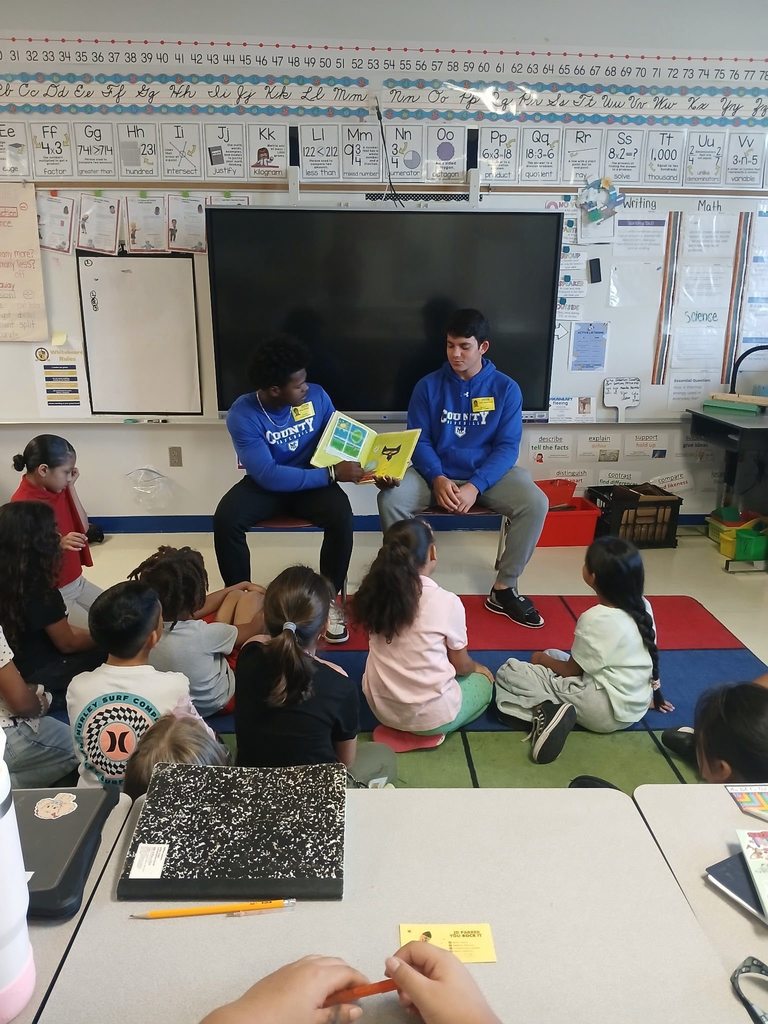 MCHS baseball players read to JDP students