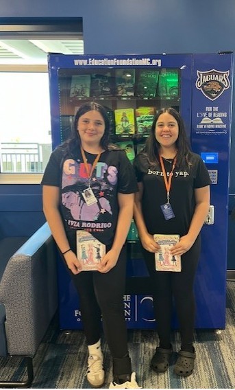Students with their books. 