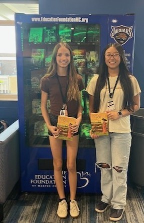 Students with their books. 