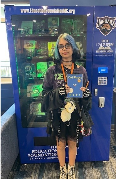 Student with a book. 