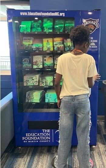 Students with their books. 