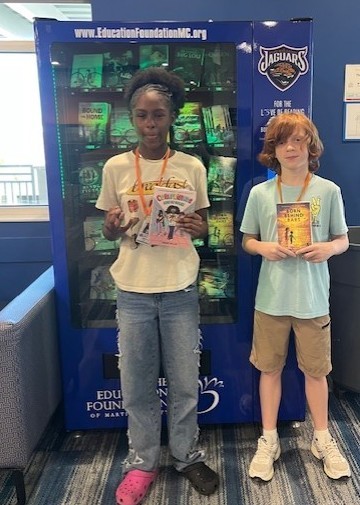 Students with their books. 