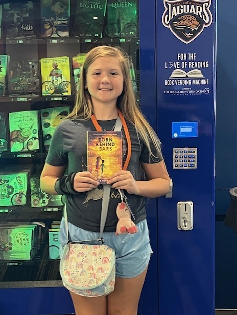 Student with a  book. 