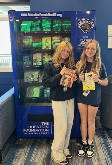 Students with their books. 