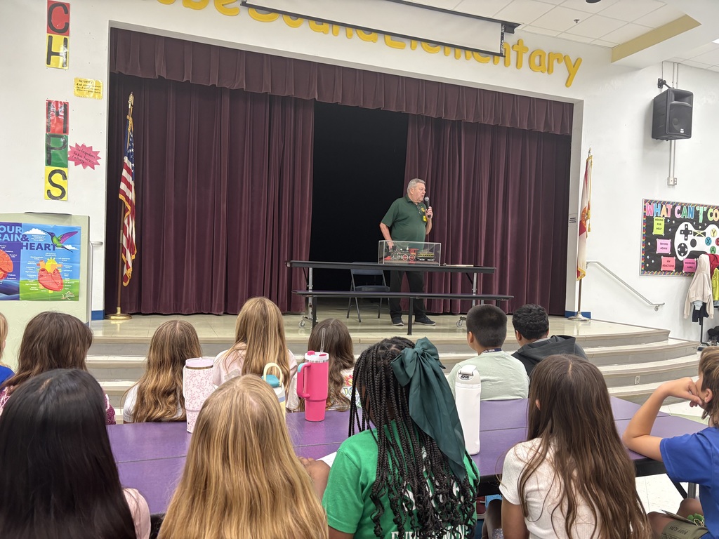 Mr. Harrington of the railroad club in Martin county presents to 4th graders