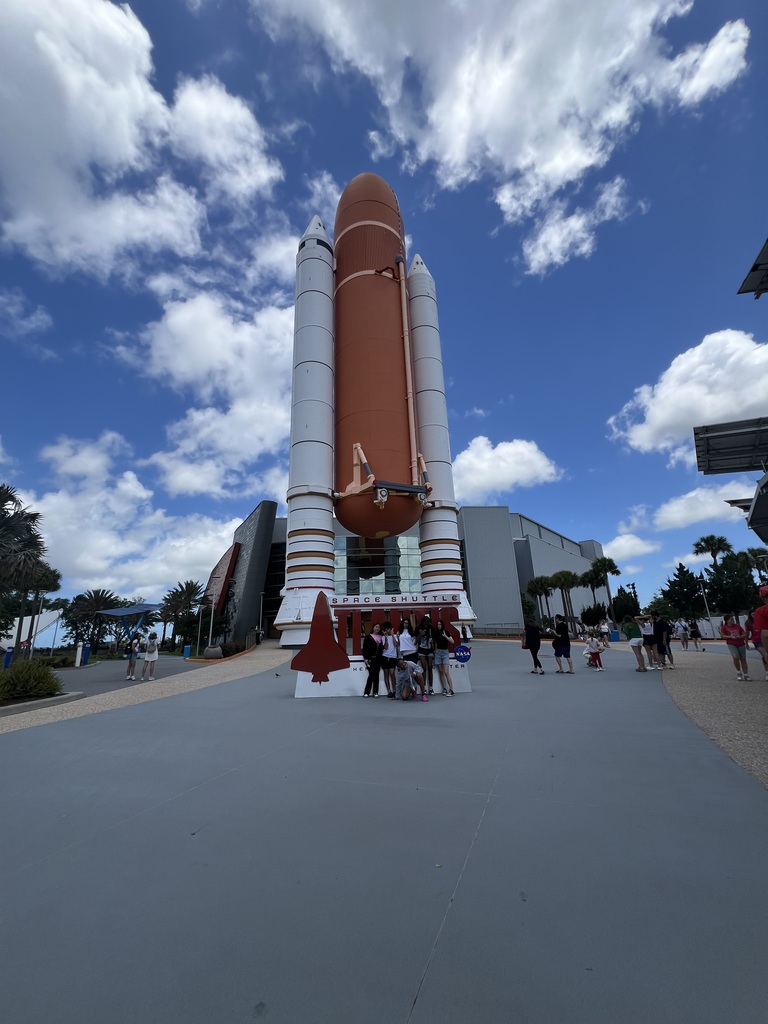 Posing with the rocket