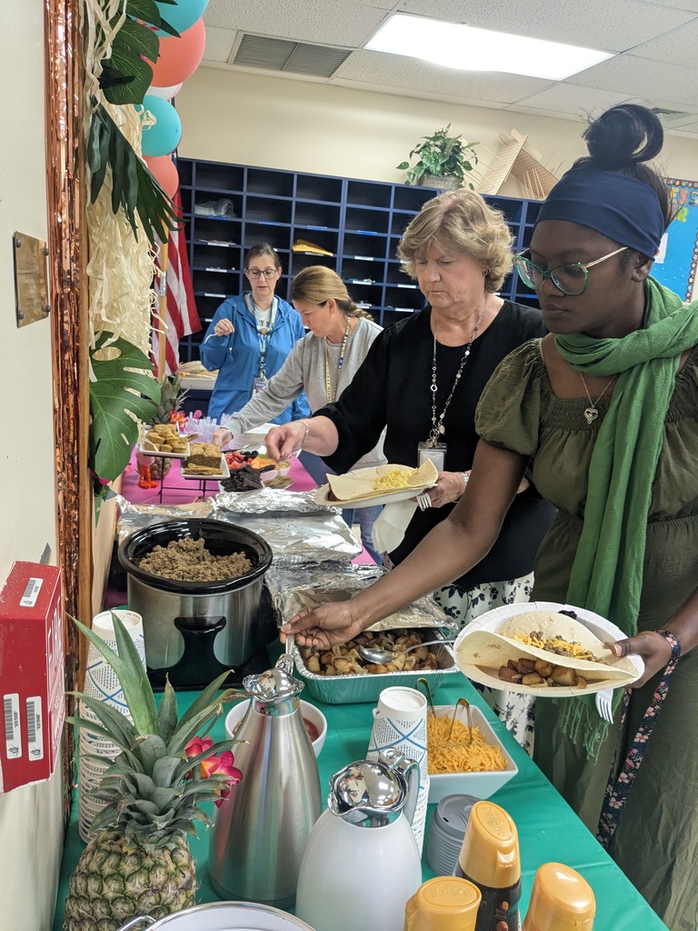 Teachers Enjoying Breakfast