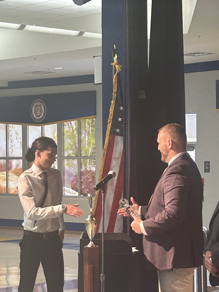 Coach McChrystal giving an award