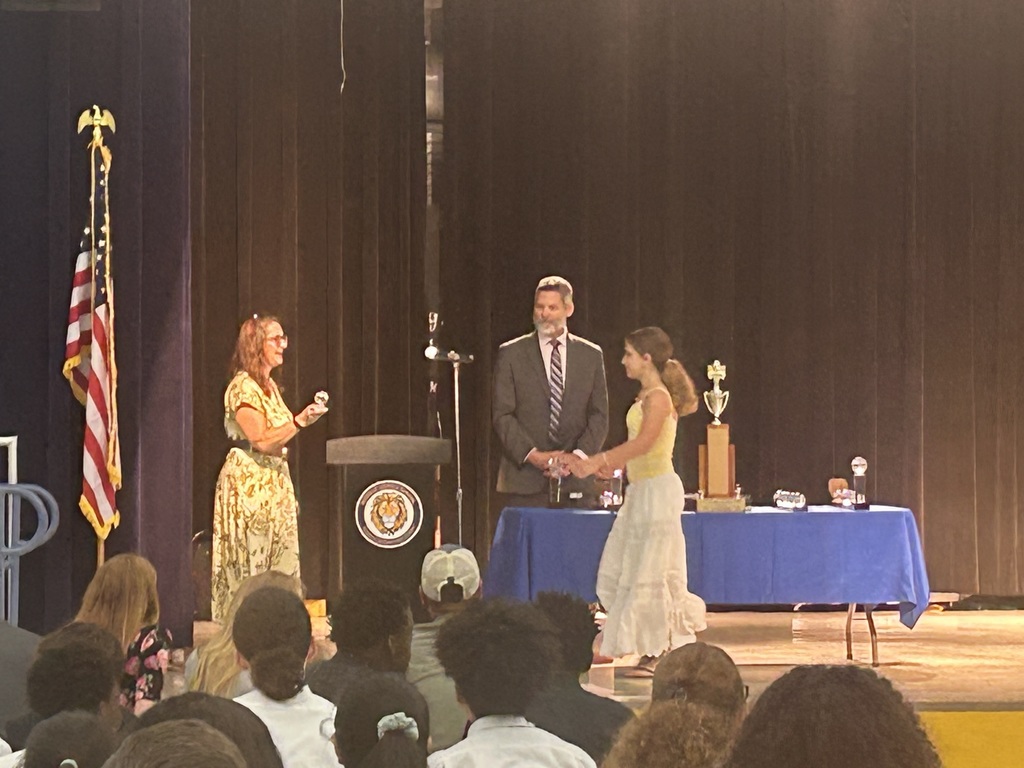 Coach Marino giving an award
