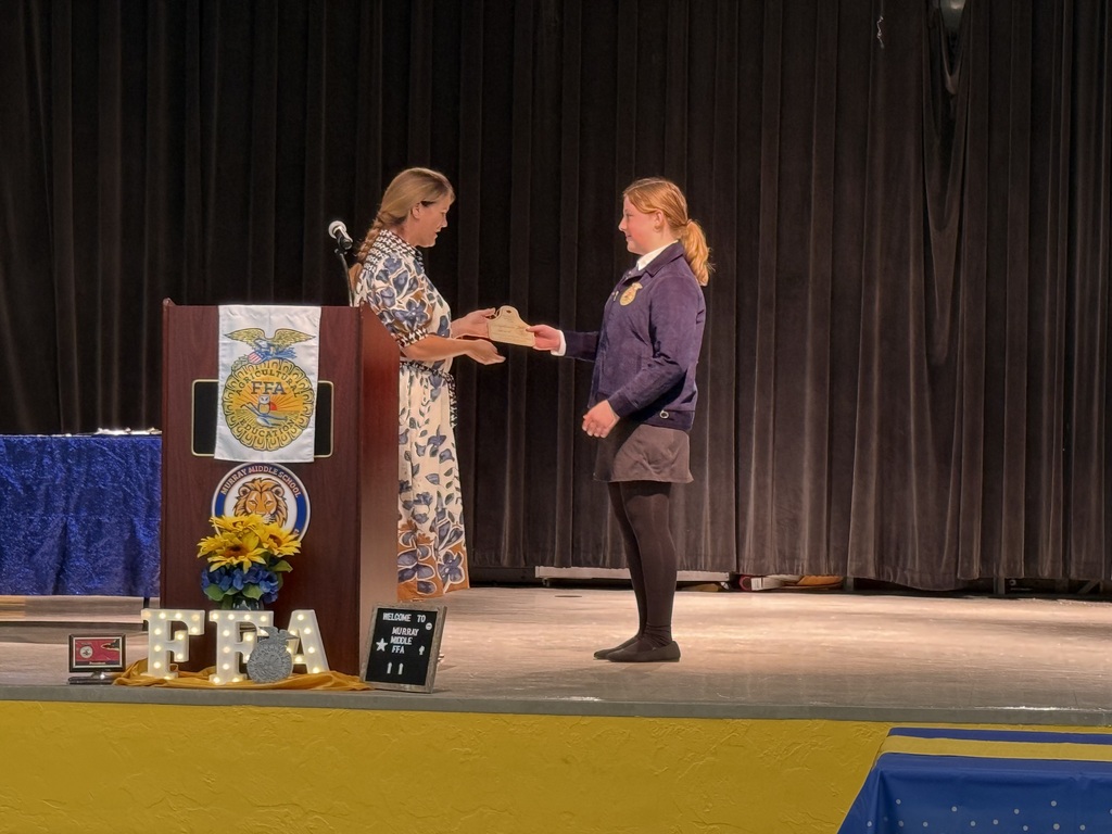 Ms. Black presenting an award