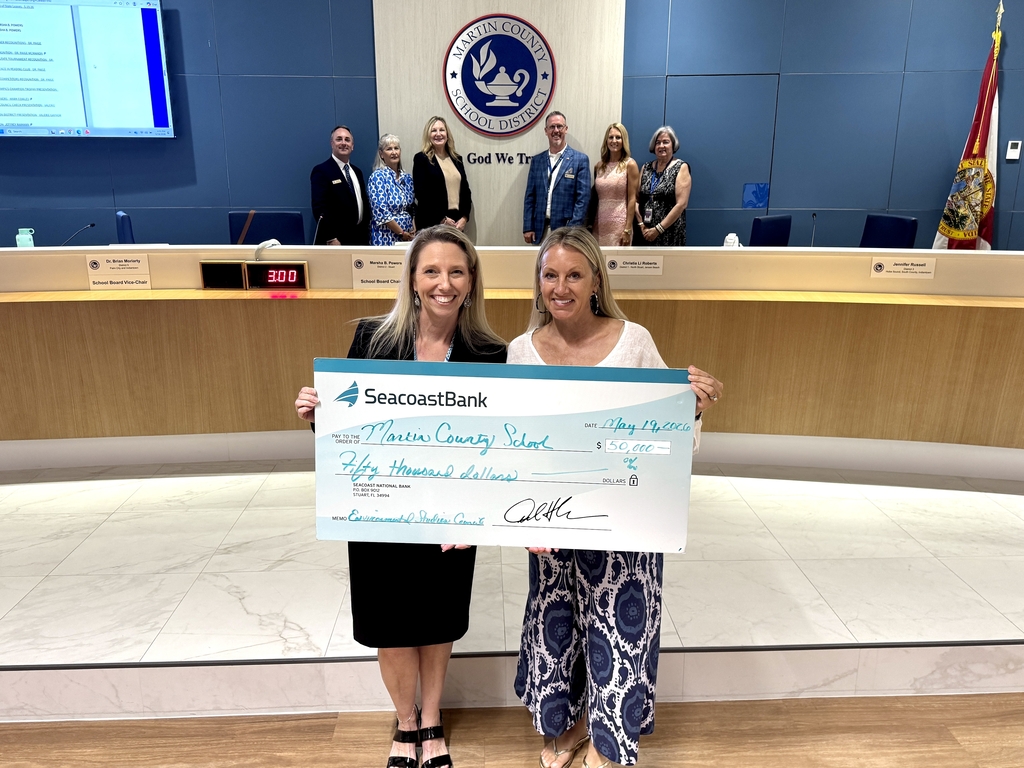 Environmental Studies Council donates check to partially fund ESC employee