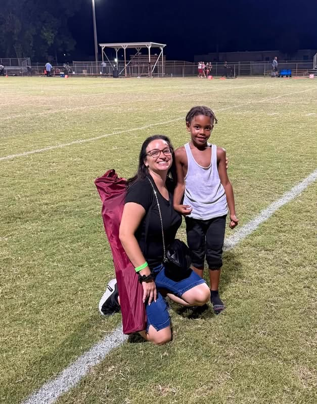 Warfield teachers support students at local football game