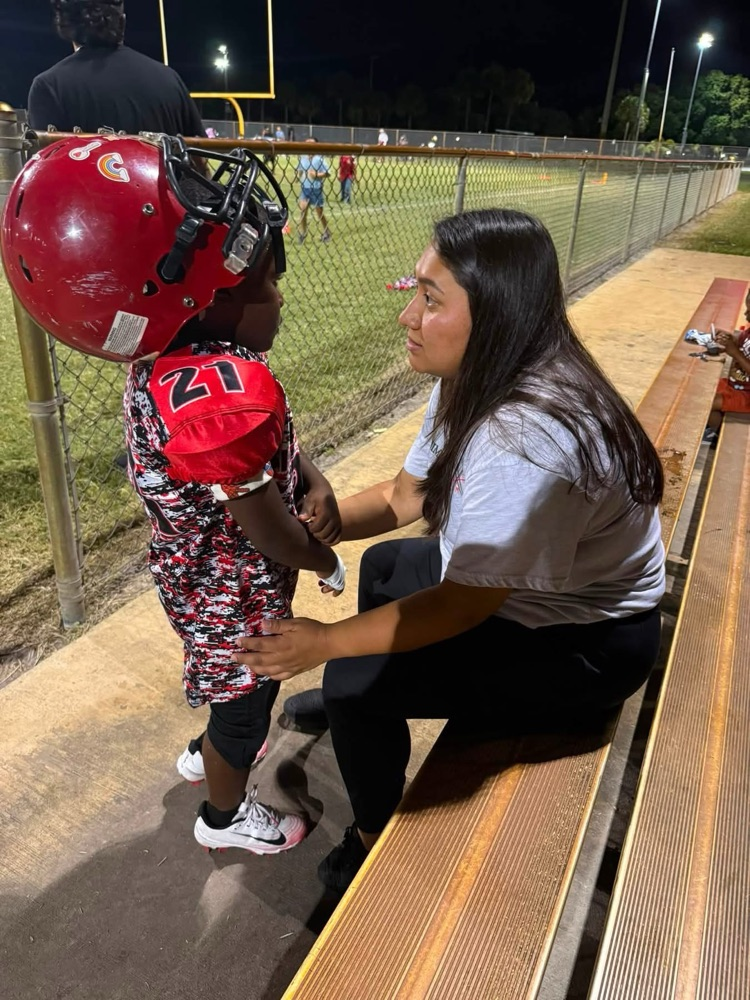 Warfield teachers support students at local football game