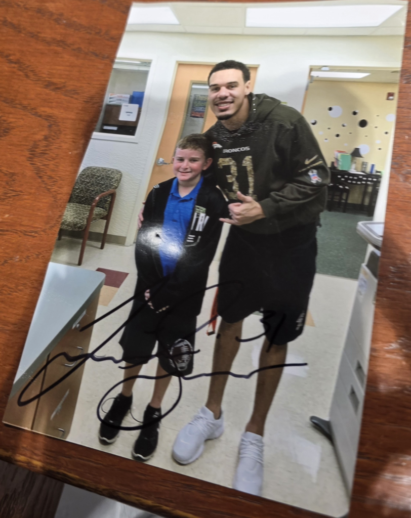 Justin Simmons with Gavin Farrell at Pinewood Elementary School