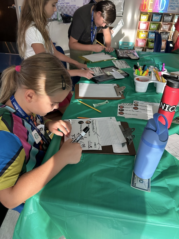Our 4th graders became baristas for the day! They put their math skills to work by handling money, adding and subtracting multi-digit decimals, calculating totals, and making change—all while serving up some serious fun! 