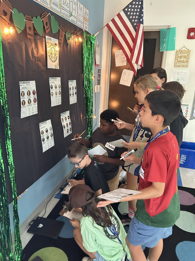 Our 4th graders became baristas for the day! They put their math skills to work by handling money, adding and subtracting multi-digit decimals, calculating totals, and making change—all while serving up some serious fun! 