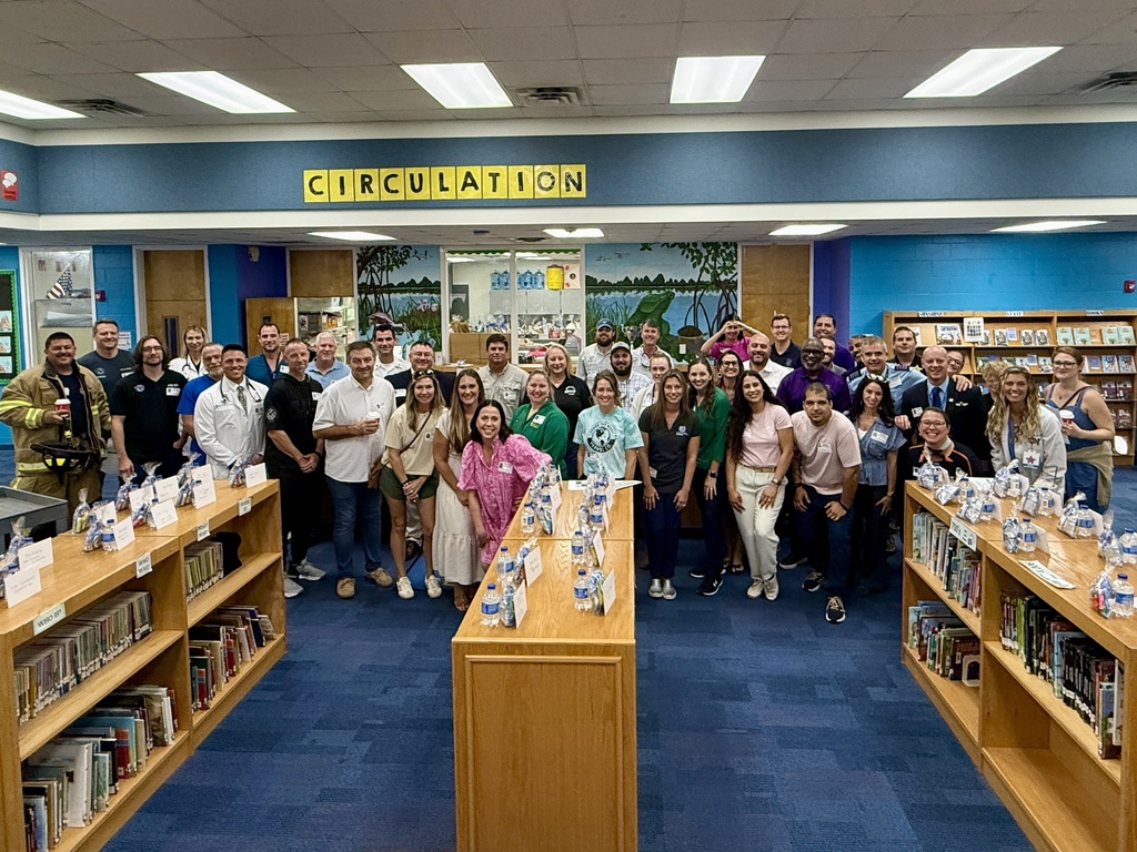 Career Fair speakers gather in Bessey Creek's media center before heading to classrooms.