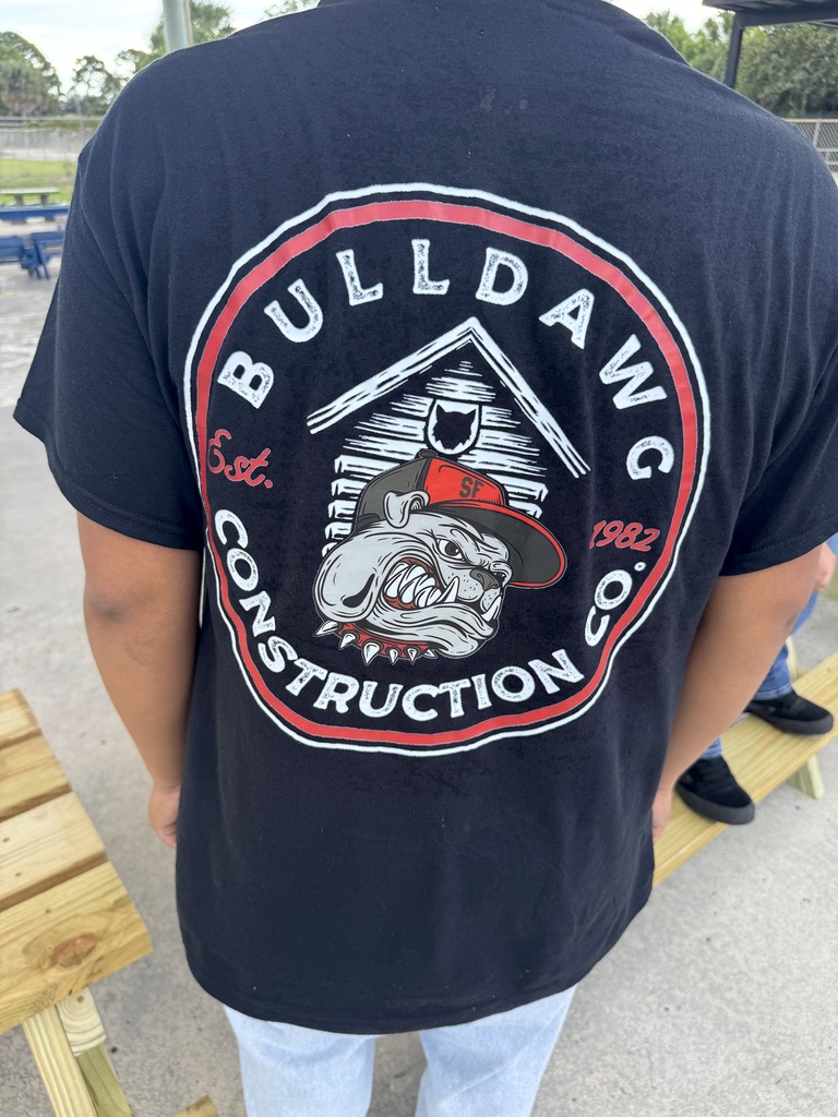 Back of SFHS construction student t-shirt that says Bulldawg Construction Est. 1982