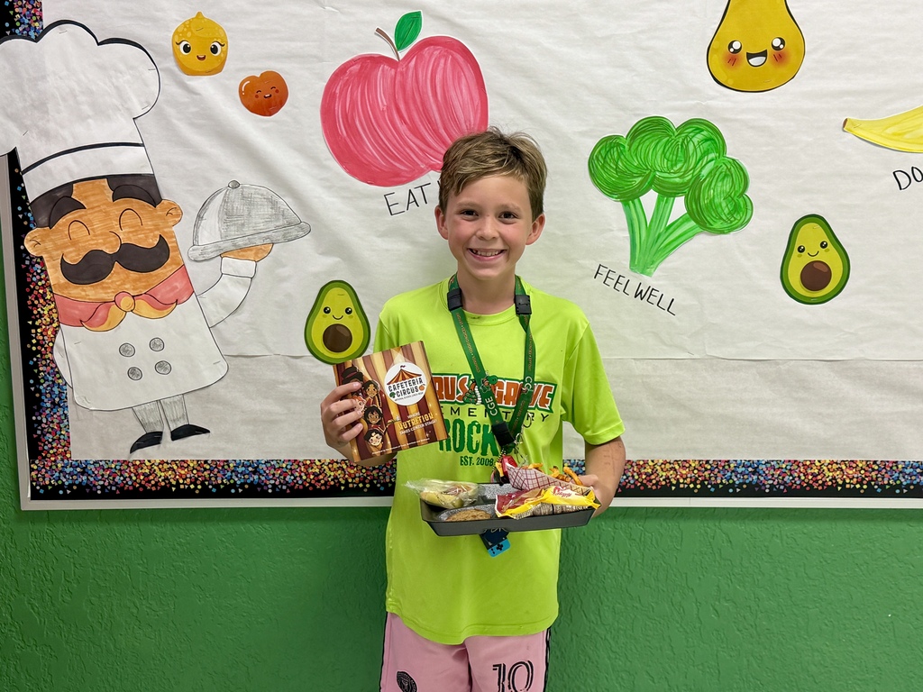 CGE Student with lunch tray.