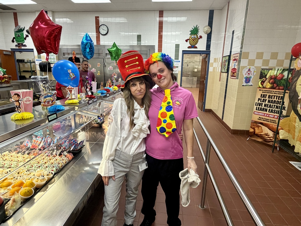FNS employees dressed up in circus costumes at CGE