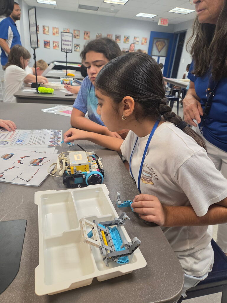 MCSD Students from SeaWind and Hidden Oaks exploring STEM at the S.P.A.M. Robotics Center at the School District Office