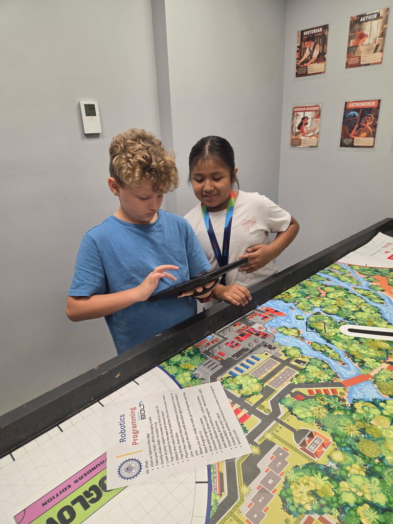MCSD Students from SeaWind and Hidden Oaks exploring STEM at the S.P.A.M. Robotics Center at the School District Office