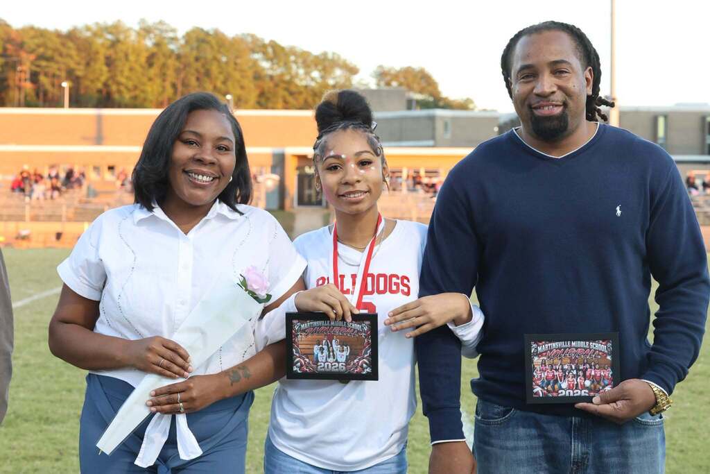 8th grade student-athlete with their family on MMS 8th grade night