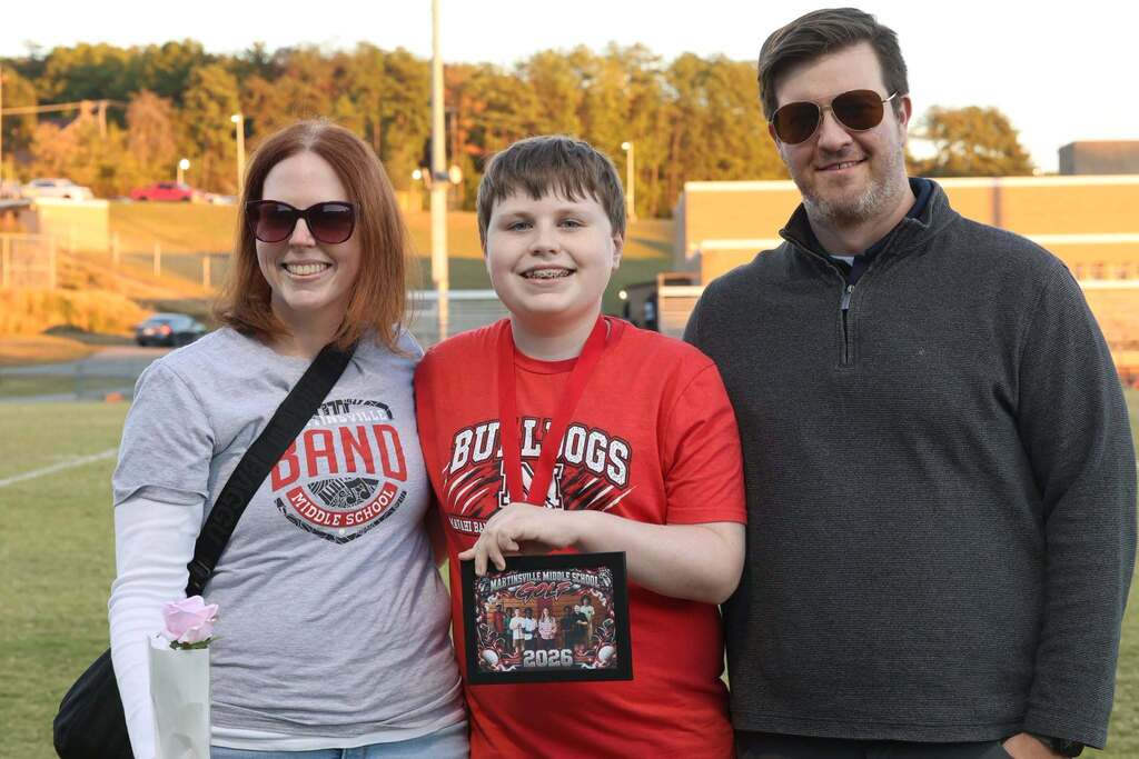 8th grade student-athlete with their family on MMS 8th grade night