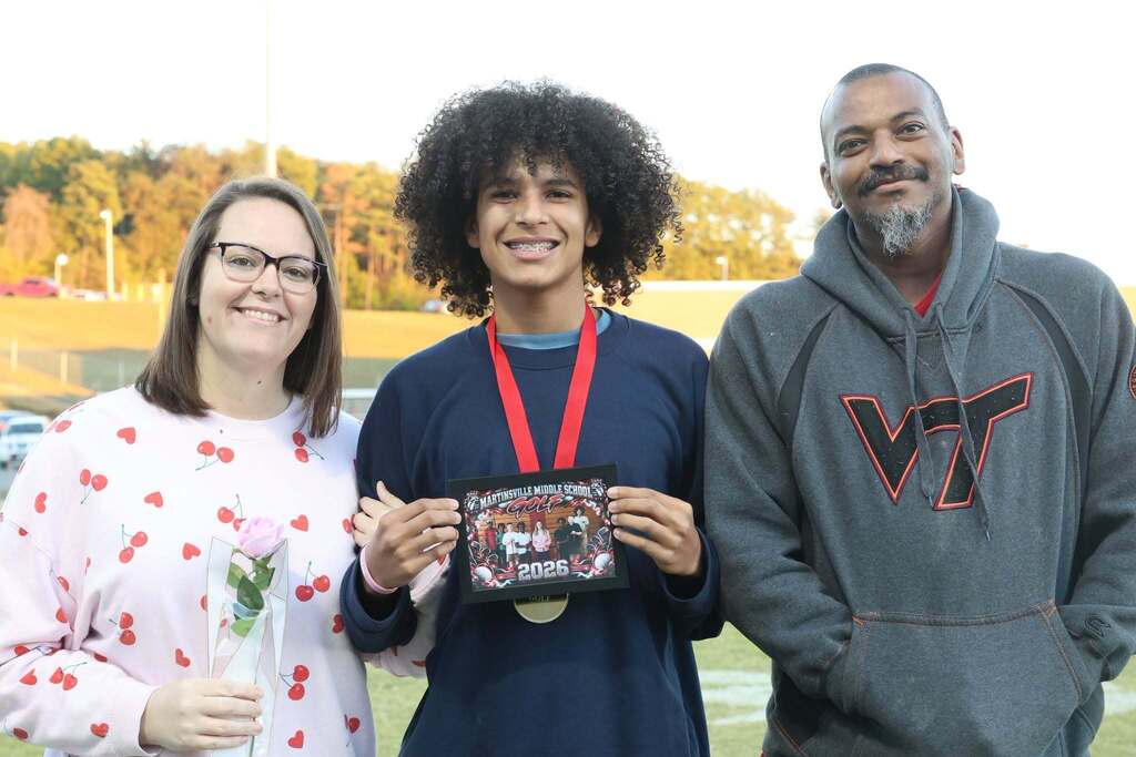 8th grade student-athlete with their family on MMS 8th grade night