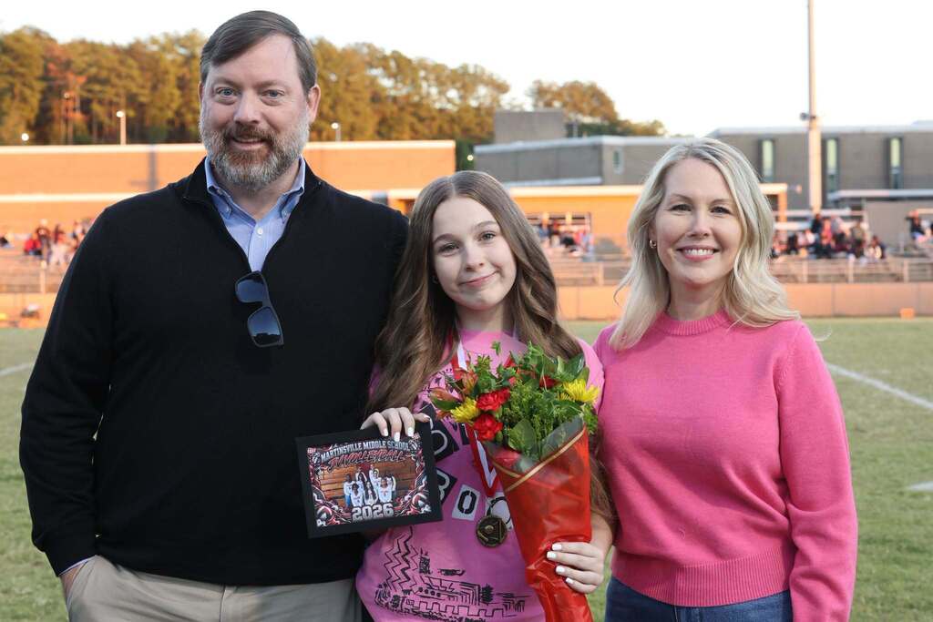 8th grade student-athlete with their family on MMS 8th grade night