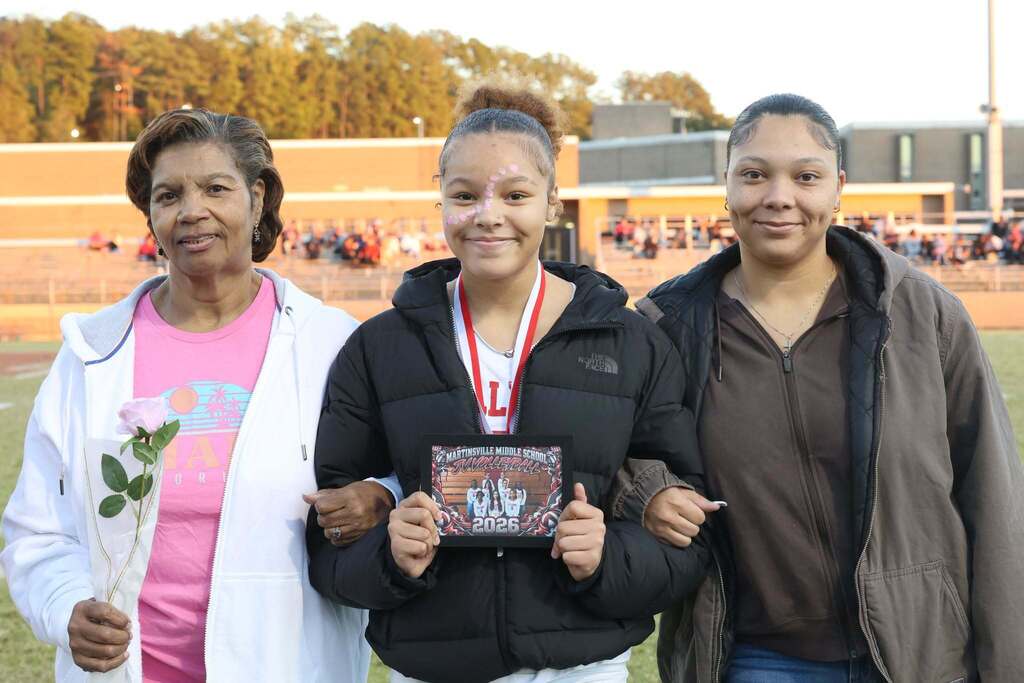 8th grade student-athlete with their family on MMS 8th grade night