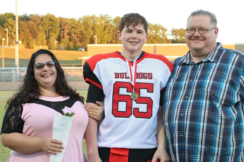 8th grade student-athlete with their family on MMS 8th grade night