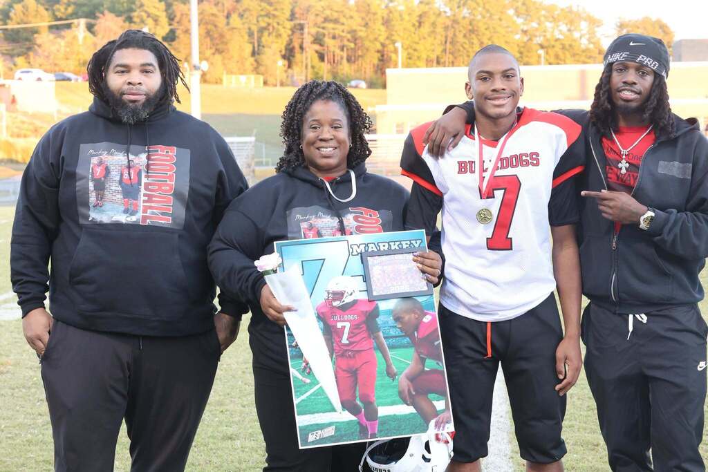 8th grade student-athlete with their family on MMS 8th grade night