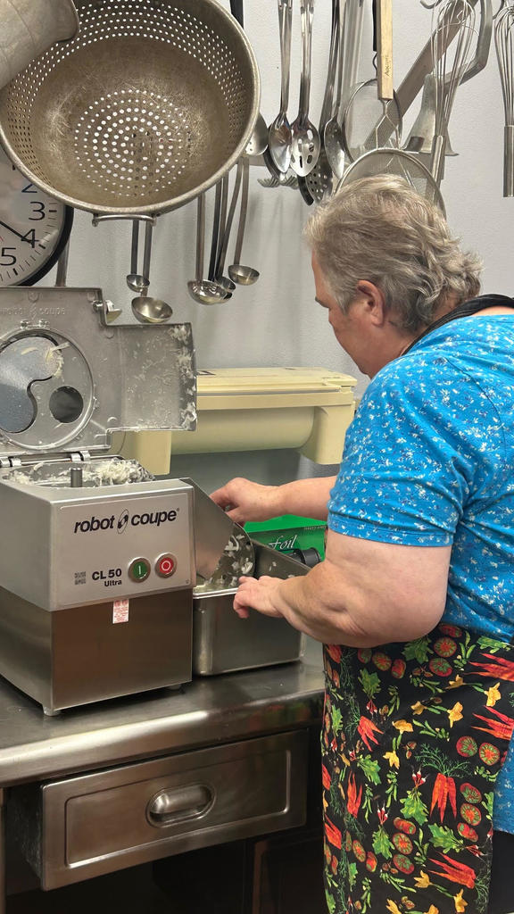 Margaret using the Robot Coupe