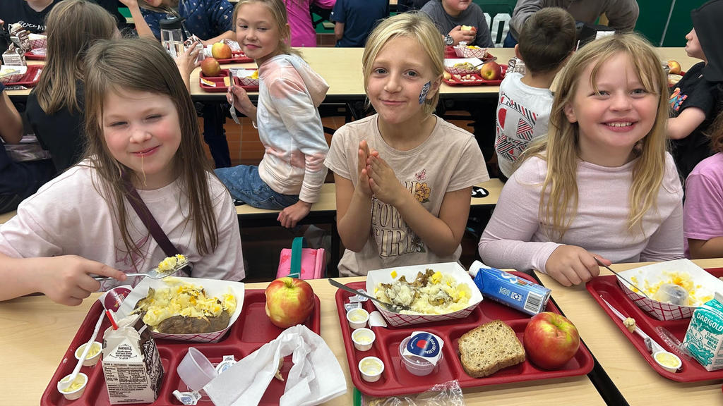 Hazel, Grace, & Analea having a baked potato