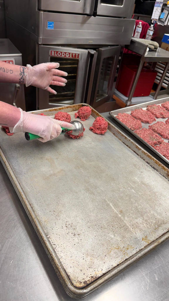Scooping Beef onto Pans