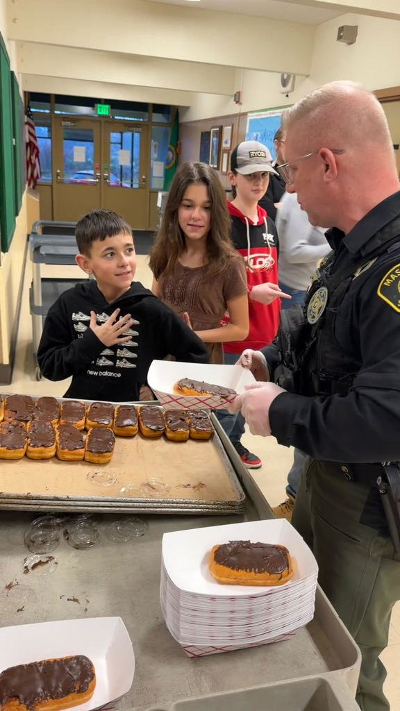 Deputy Matt Serving Breakfast to 5th Grade