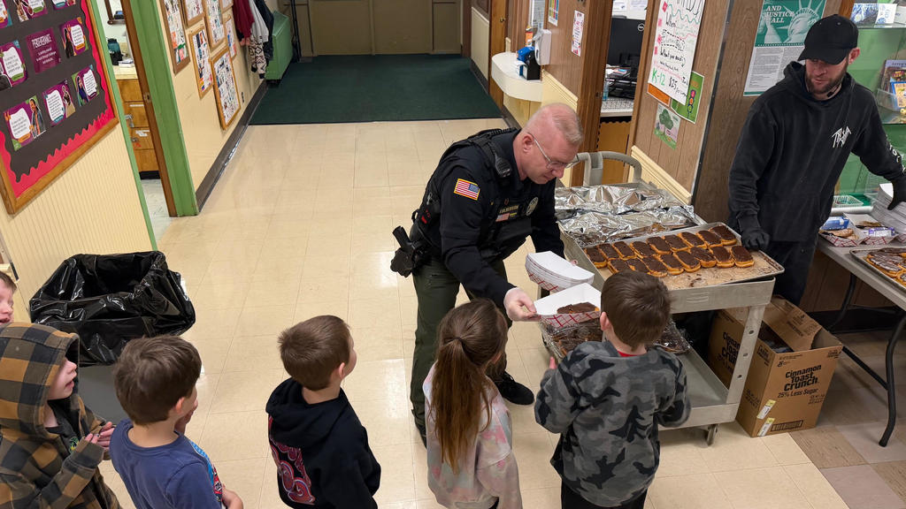 Deputy Matt Serving Breakfast to Kindergarten