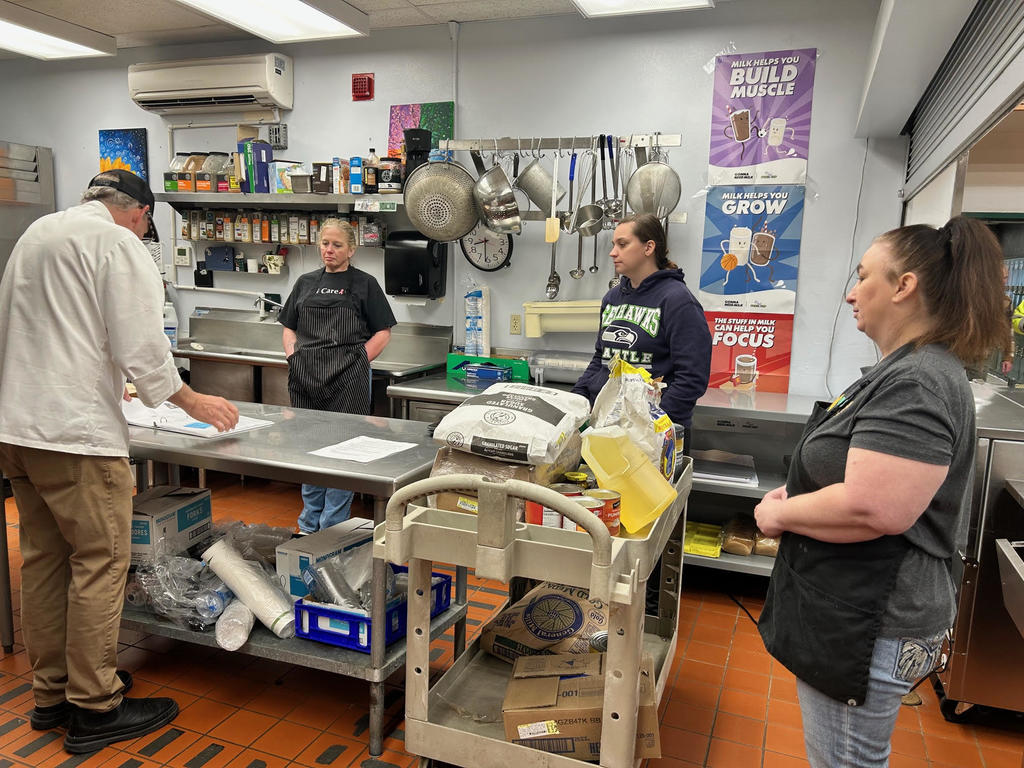 everyone engaged in what Chef Kent is saying