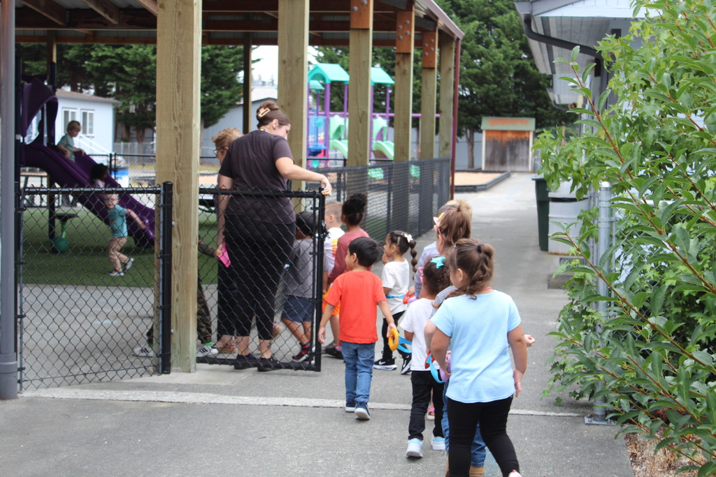 Children are seen heading to recess