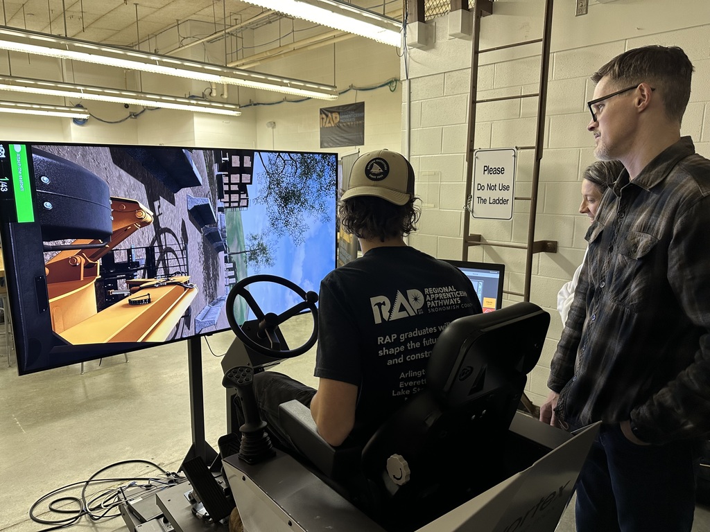 A student uses a driving simulator