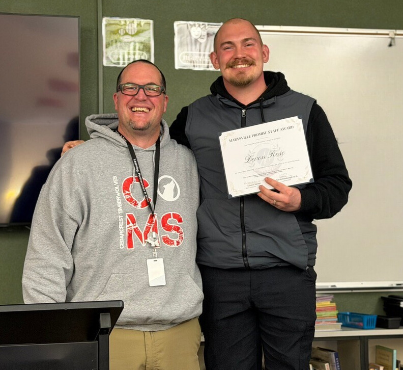 Jay and Devon with award