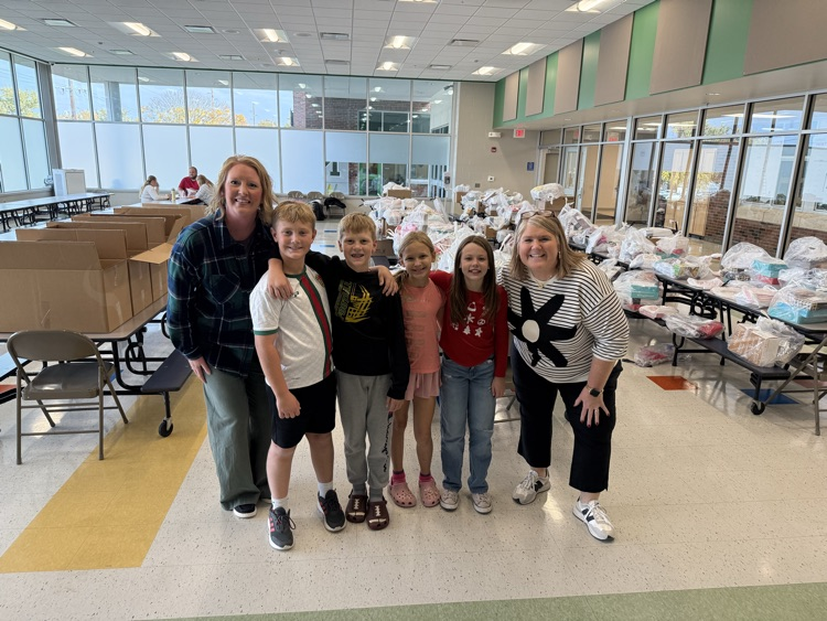 These kids worked hard unloading boxes of our FundraiserU goodies!! It's ready for pickup!  