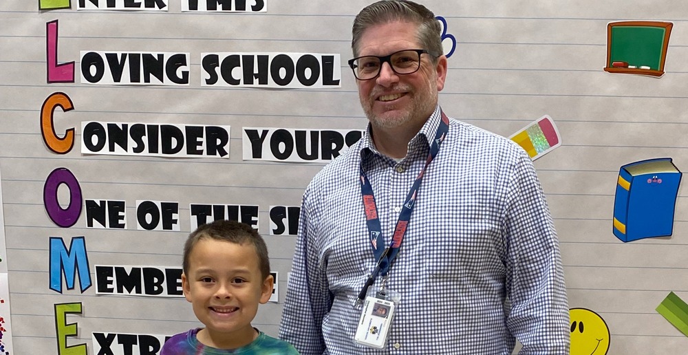 Principal as Community Member with 1st Grade Student