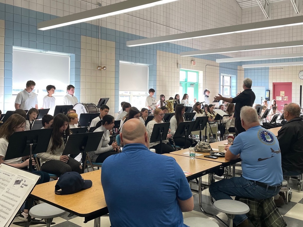 A photo of Boynton Band students performing at the Veteran's Day Breakfast in the cafeteria.