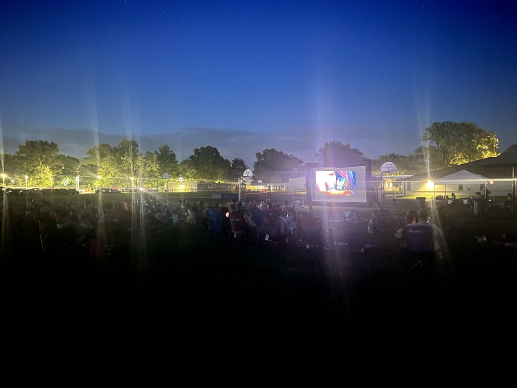 MES families gather for an outdoor movie night sponsored by the PTO.