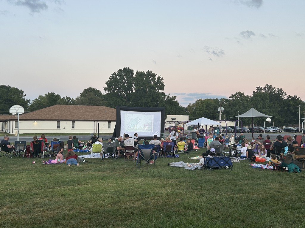 MES families gather for an outdoor movie night sponsored by the PTO.