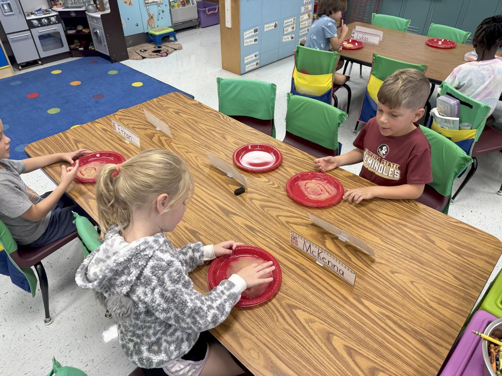 Mrs. Taylor's class celebrating Johnny Appleseed's birthday week with all things apples!
