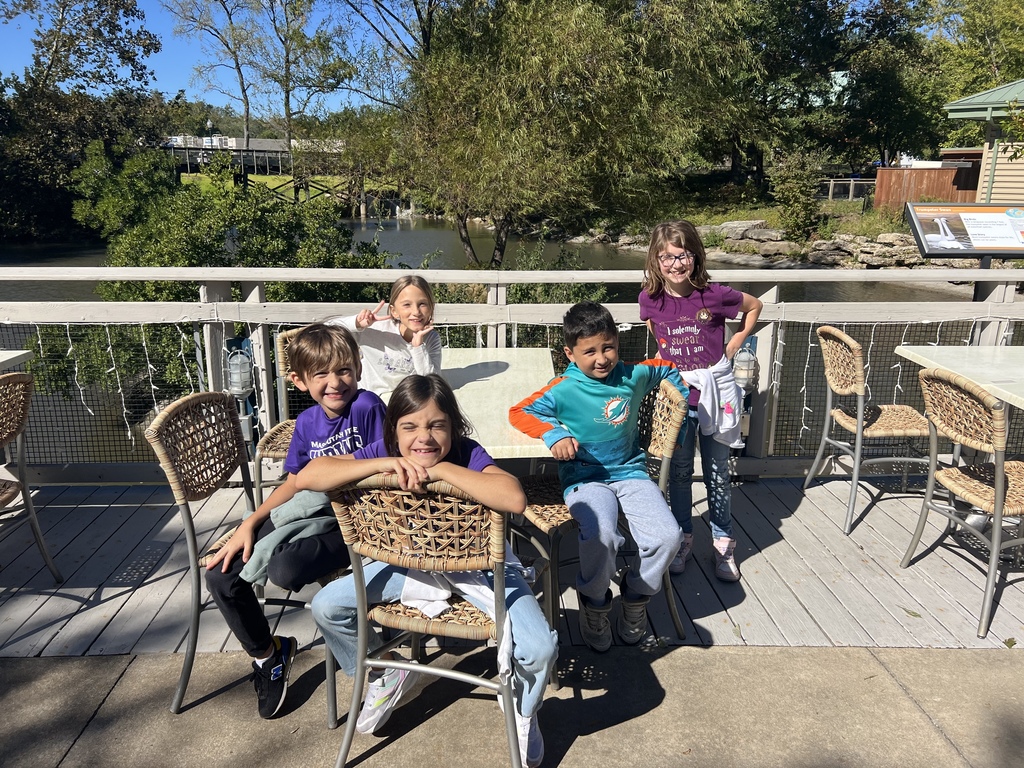 Kids sitting at a table 