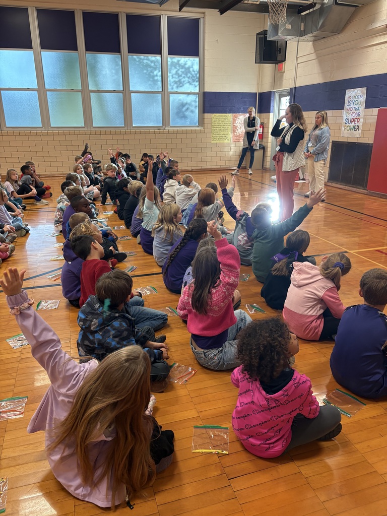 Kids sitting and listening 